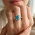 Radiant Emerald-Cut Blue Topaz Statement Ring Discover the timeless elegance of this beautifully crafted ring. This piece...