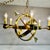 Hand rubbed antique brass with six candles with bulbs. 60 watt bulbs recommended. Two outer rings make up the chandelier...