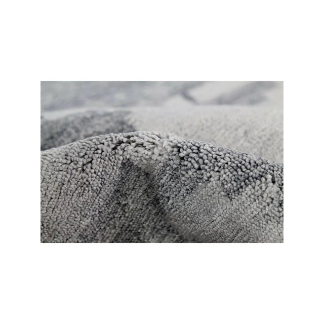 Elevate your decor with a 10x14 Modern Abstract Rug sourced from India, blending style and sophistication seamlessly.