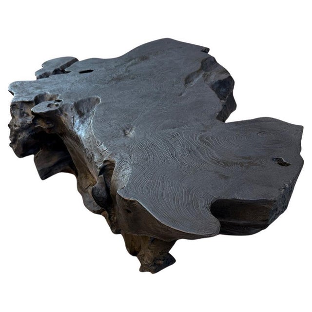 Impressive century old teak wood made into a one of a kind coffee table of bench whilst respecting the natural organic...