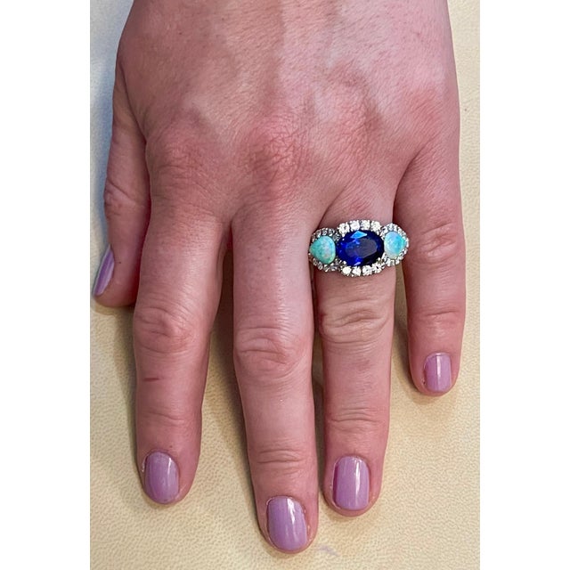 This extraordinary, 5 carat tanzanite is truly an extraordinary gemstone. There are total of 1.5 carats of shimmering...
