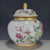 Enhance your interior with this elegant Chinese Famille Rose porcelain jar. This exquisite piece features a rounded body,...
