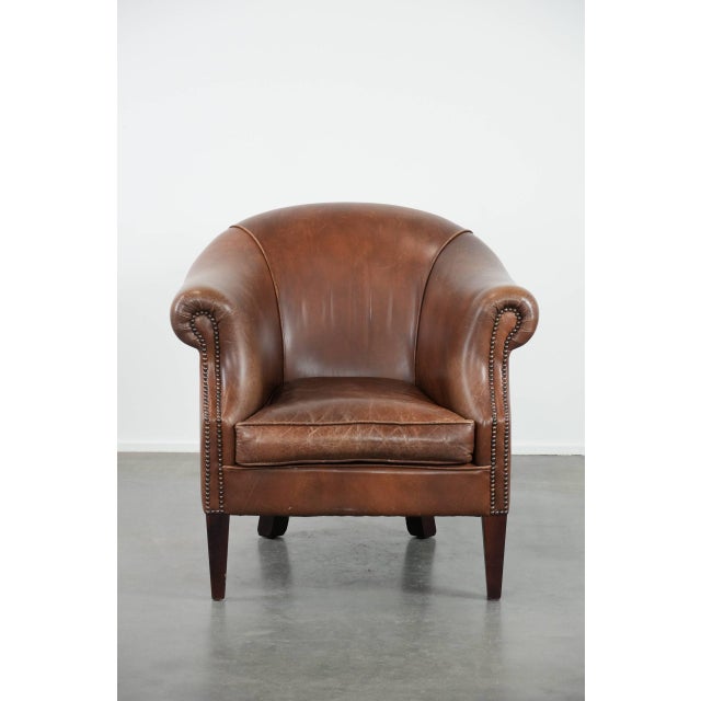 This cowhide club armchair is a comfortable and stylish addition to virtually any interior in any room you choose. This...