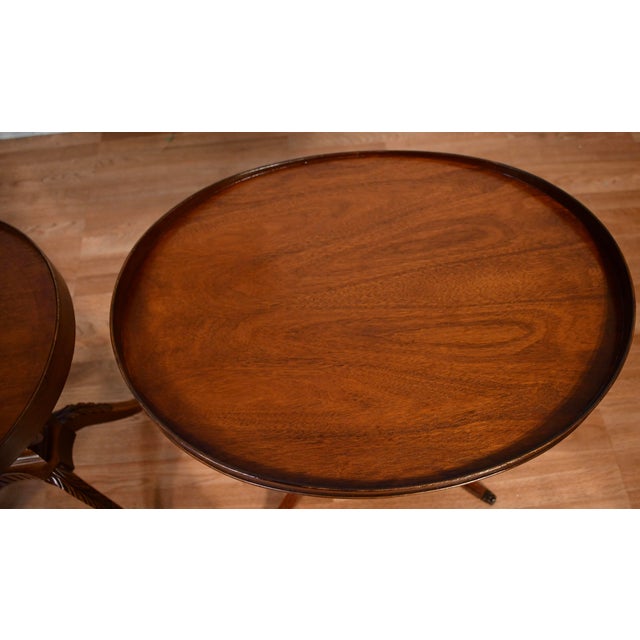 We are pleased to offer this beautiful pair of Duncan Phyfe style side tables, by Mersman from the 1940s.​ This pair is...