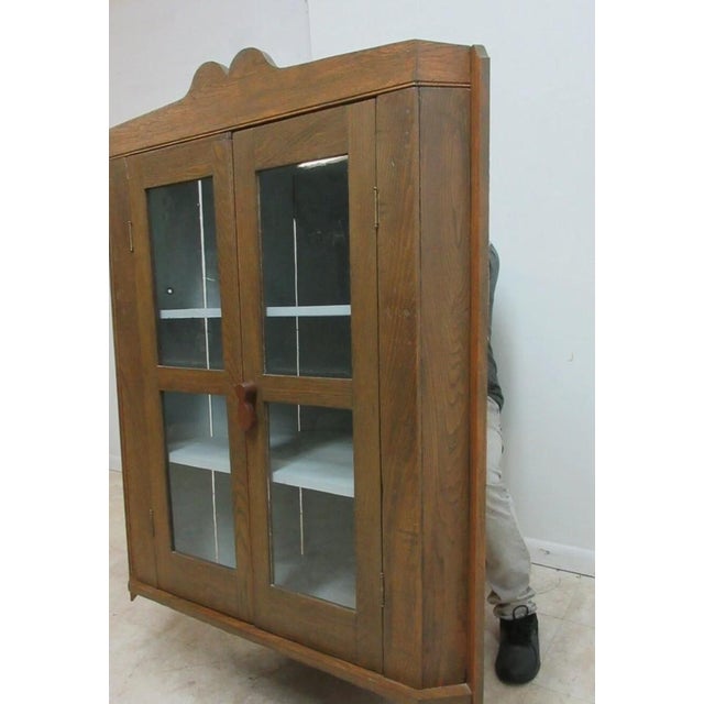 corner space 28.5 x 28.5 Great shape tight and sturdy. age related wear. has been refinish at dome point in time.. cabinet...
