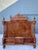 This magnificent Victorian Eastlake style bedframe is a masterclass in late 19th-century architectural furniture. Crafted...