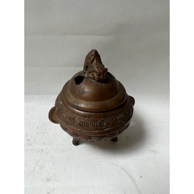 20th century Vintage Bronze Foo Dog Asian Incense Burner High Relief Approximately 3.5” tall 2.5” widest Good condition BKS