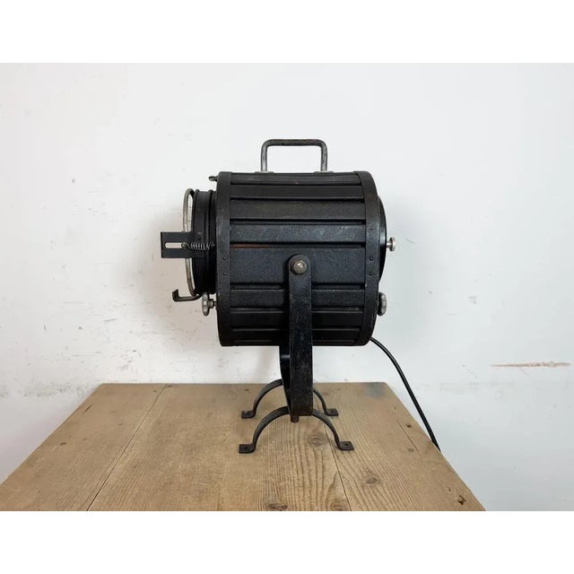- Vintage theatre spotlight table lamp made in former Czechoslovakia during the 1960s - It features a black metal body and...