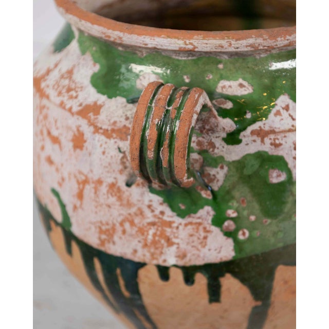 This French confit pot dates to about 1840 and is finished in a green glaze over the upper body. Vessels of this kind were...
