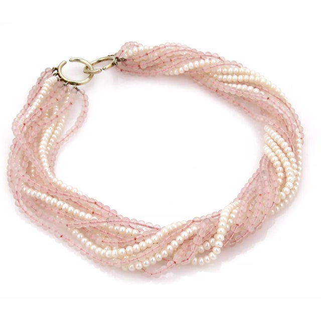 Material: sterling silver Hallmark: 1983 Tiffany & Co. 925 Measurement: 16.5" long x 0.60" thick Gemstone: rose quartz...