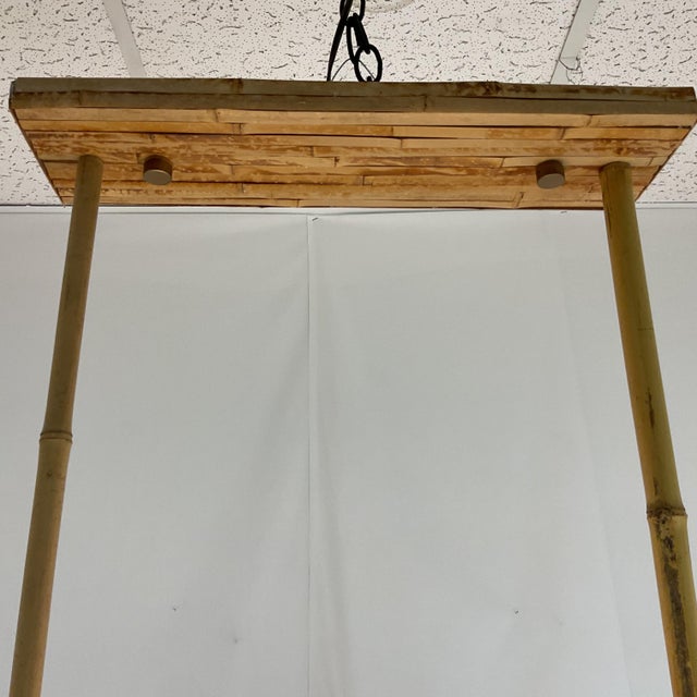 Bring natural warmth and relaxed sophistication to your space with this striking handcrafted bamboo pendant light....