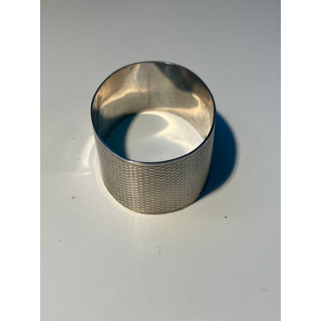 This is a really nice vintage Deakin & Francis, English sterling silver, engine turned, napkin ring. It is not...