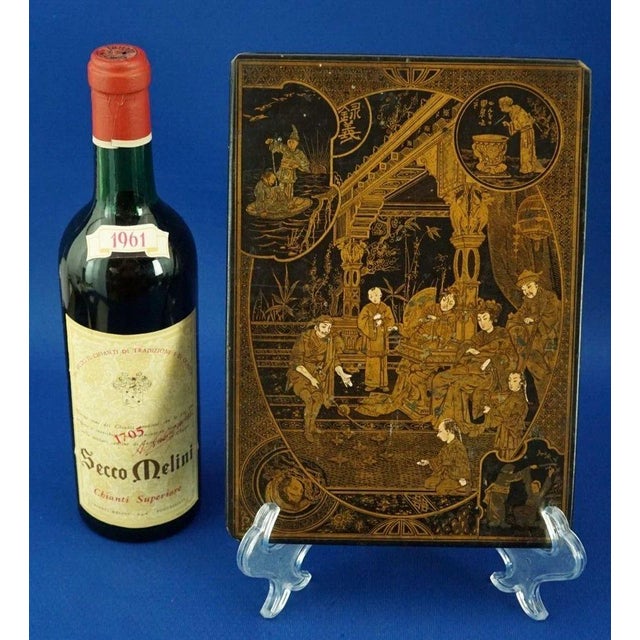 Paper mache panel lacquered and painted in gold, originally designed as the lid of a treasure chest or box. The work was...