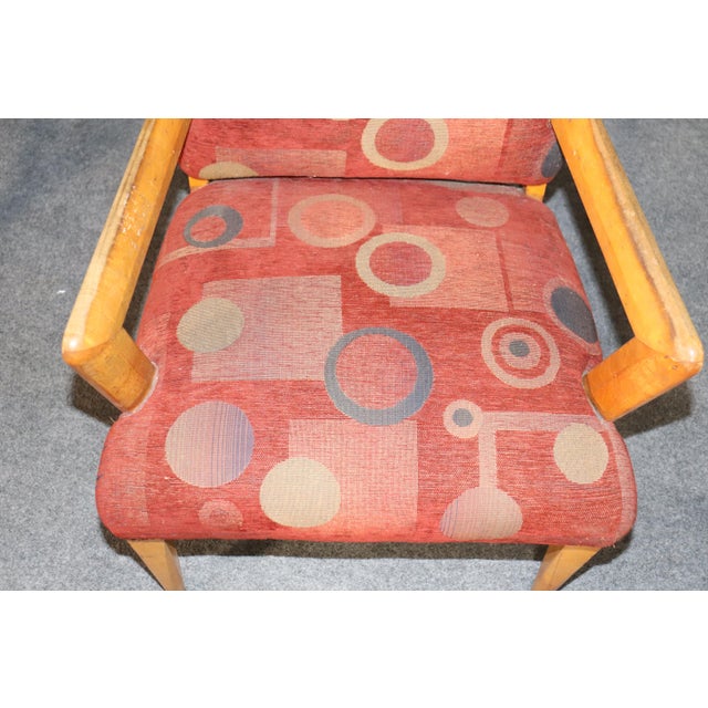 Pair of maple armchairs with sharp deco style lines. Please confirm location