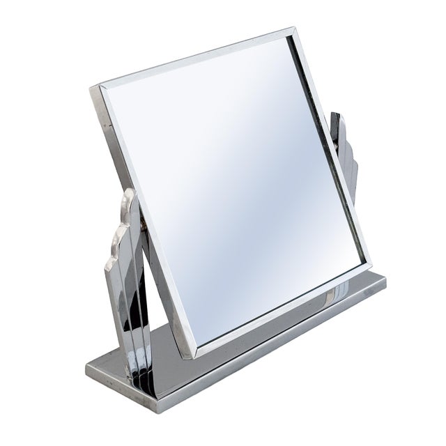 A fine French free-standing vanity mirror or dressing table mirror of chrome and mirrored glass from the Art Deco era,...