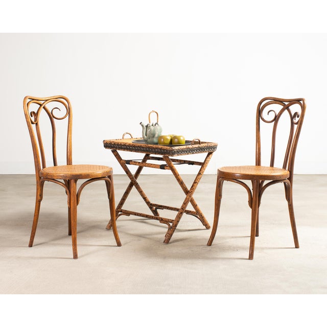A refined charming pair of stamped Jacob and Josef Kohn for Mundus Viennese bent beechwood side chairs from the Art...