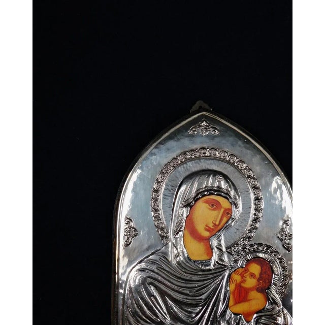 Orthodox Religious Icon of the Virgin and Child in Repoussé 925 Silver Celebrate your Orthodox faith under the protection...