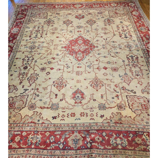 An exceptional and highly sought-after “near square” oversized Turkish Oushak from the early 1900s, this piece exemplifies...