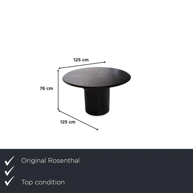 This Rosenthal Quadrondo dining table is a true statement piece for your dining room, instantly drawing attention with its...