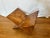 This beautifully hand-carved folding stand is made from a single piece of solid teak wood (or similar hardwood) with...