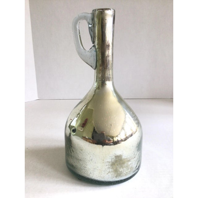 1940s Mercury Glass Jug Vase Handle in a solid clear blown glass the rest mercury glass A uniquely shaped vessel for...