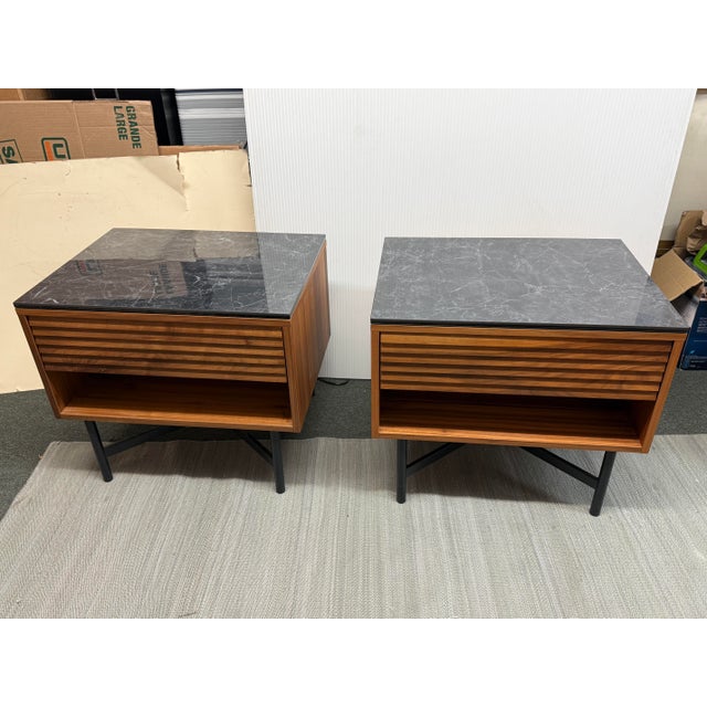 Design Plus Gallery presents a Pair of Adrian Nightstands from Room & Board. The nightstands have a solid wood louvered...