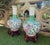 Pair of Late Qing Dynasty Chinese Famille Rose Phoenix Bottle Vases with Stands (c. 1875–1911) Dimensions: Vase (each):...