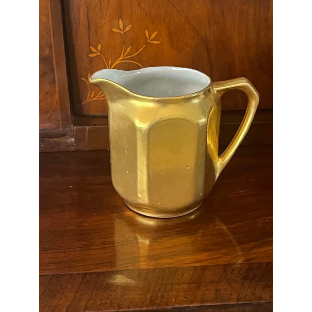 Two pieces Vintage Austrian porcelain gold creamer Art Deco style and salt shaker.