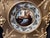 A hand painted porcelain cabinet plate with elaborate hand decorated raised gilt border, the central figure of a bishop....