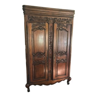 French Provincial Carved Wood Armoire For Sale