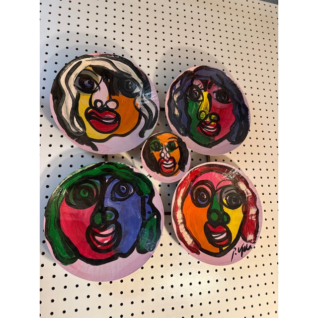 Outstanding Painting sculpture by Peter Robert Keil (born 1942) This interesting piece depicts a group of colorful faces...
