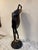 Elegant bronze figure, female nude In the style of Art Nouveau, mid-20th century. On a metal base H: 55 cm DM: 10 cm or 17 cm