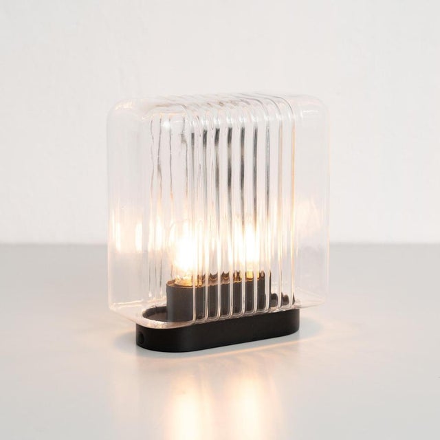 Lari mini by angelo mangiarotti, 2023 lari mini is a portable version of angelo mangiarotti’s original lari lamp from...