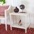 This Rafiki Rectangle Accent Table brings a touch of classic charm to any interior with its fresh new take on British...