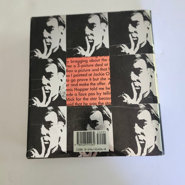 The Andy Warhol Diaries edited by Pat Hackett is a first edition hardcover book published by Warner Books in 1989. This...
