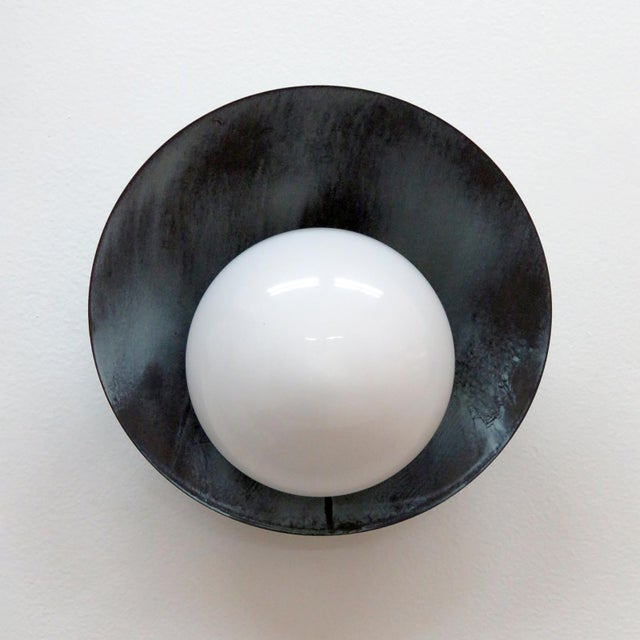 Elegant outdoor wall lights designed by Gallery L7, handcrafted and finished in Los Angeles from American brass, with...