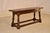 Edwardian oak joint bench from England, circa 1900. the bench has a gorgeous top, with pie crust ends, following down to a...