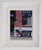 This artwork depicts a vibrant red bicycle leaning against a brick wall, creating a striking contrast against the cool...