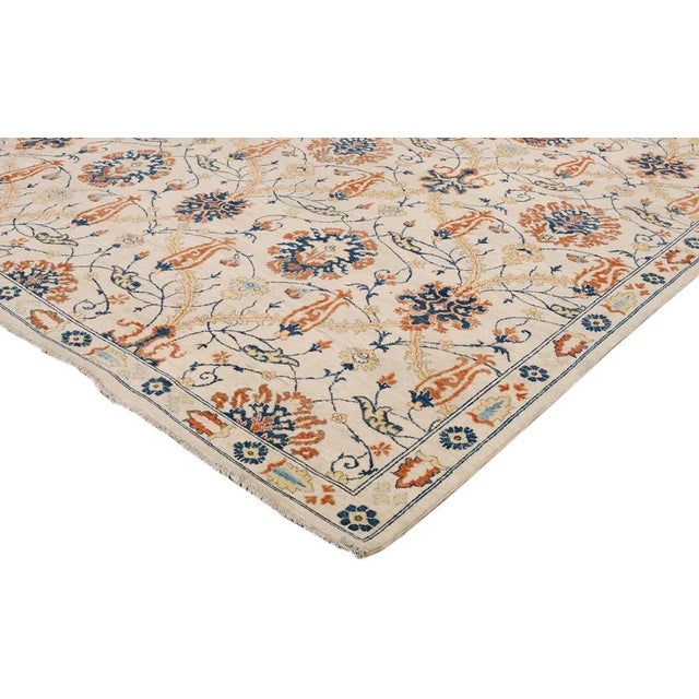 Brimming with a chic contemporary design off set by intricate motives, this lustrous hand knotted rug made with hand-spun,...