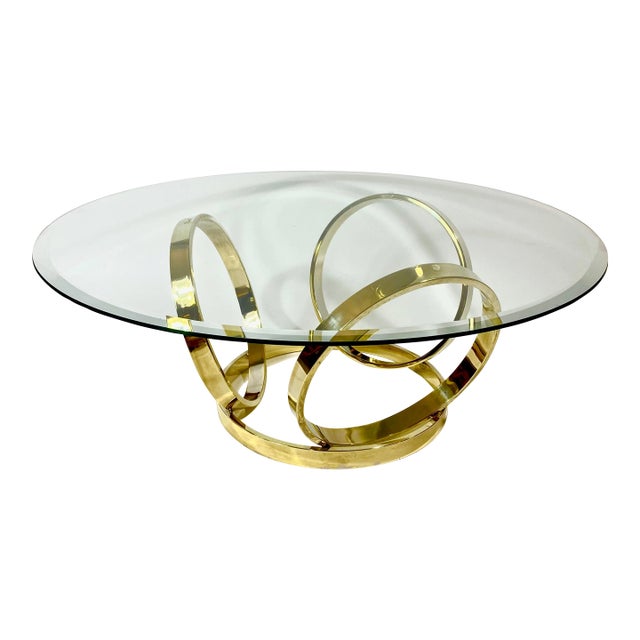 1970’s Hollywood Regency Brass Ring Glass Top Coffee Table For Sale