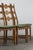 A set of 8 Danish high-back dining chairs by the acclaimed Henning Kjærnulf in the 1960s. Crafted in Denmark, likely by...