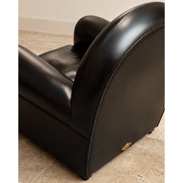A true icon of Italian design, the Vanity Fair armchair, model 904, was designed by Renzo Frau and introduced into...