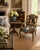 An elegant French Provincial Louis XV style fauteuil showcasing a beautifully carved giltwood frame upholstered in richly...