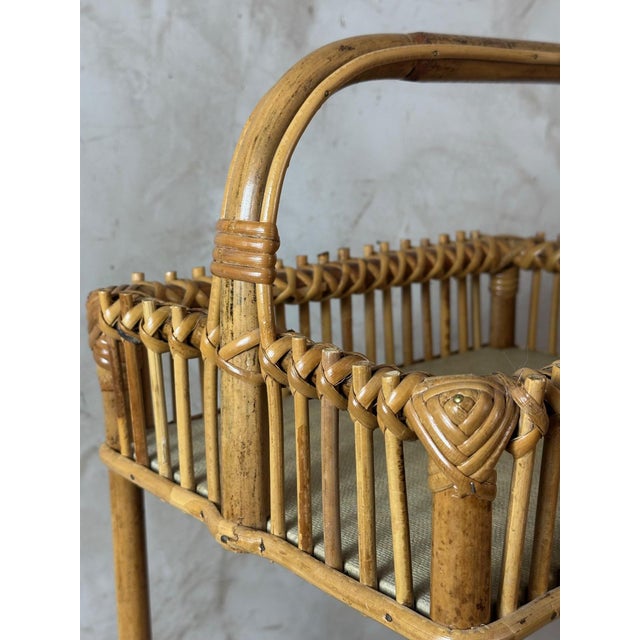 Charming rattan bottle rack dating from the 1960s, emblematic of the design and lifestyle of that era. Made of natural...