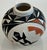 Purchased from the top of a Mesa in in Acoma, New Mexico this vase is a wonderful example of the Native American Acoma...