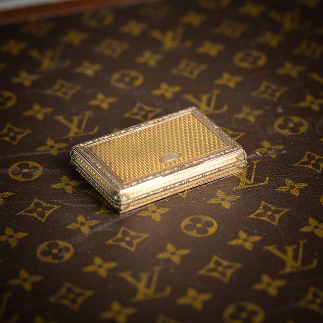 Antique mid-19th century german (hanau) gold box of rectangular form, the hinged lid with a finely engine turned ground...