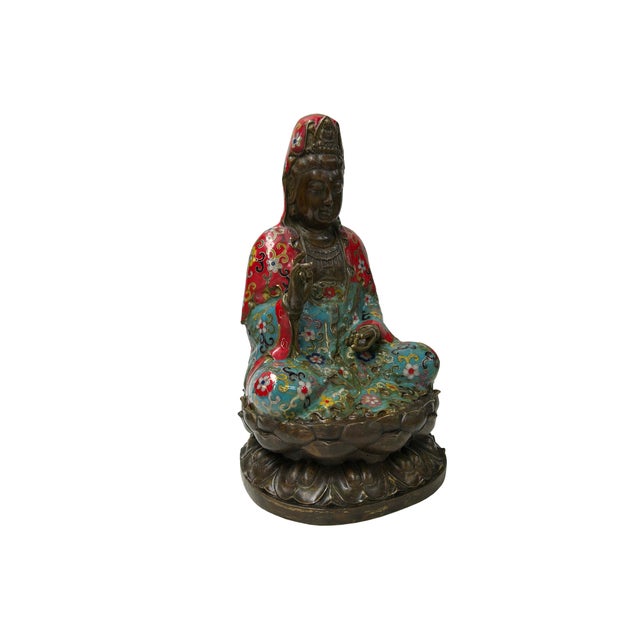 This ornate bronze statue depicts Guanyin, the Bodhisattva of Compassion, seated in a meditative pose atop a tiered lotus...