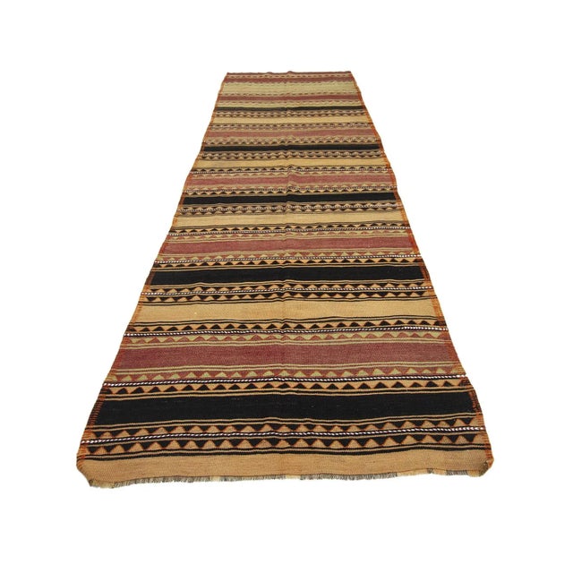 Vintage handwoven decorative kilim rug from Kars region of Turkey. Approximately 50-60 years old. In very good condition.