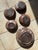 This set of ceramic bowls from the Serocka workshop showcases the characteristic warm brown glaze with its fine speckles...
