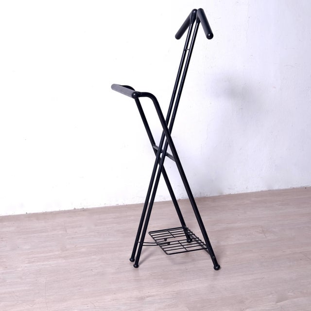Beautiful valet stand, coat hanger, foldable. Used, in very good condition (see photo).